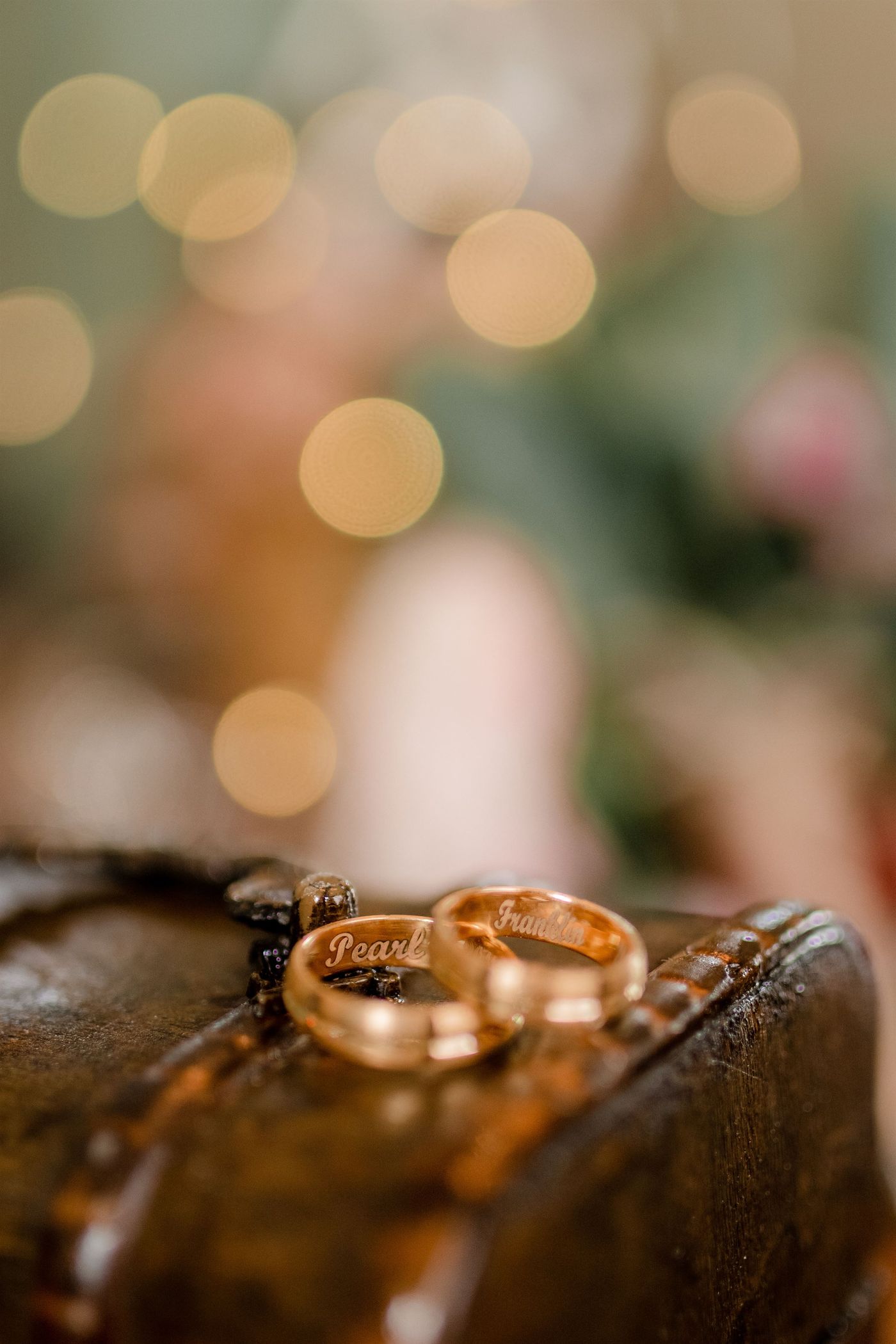 Close-up of engraved wedding rings